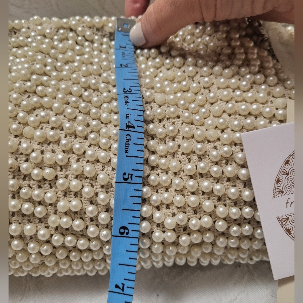 Elegant Cream Beaded Clutch with Curved Frame - Picture 10 of 15